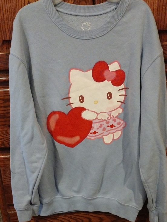 Hello Kitty Sweaters - Hello Kitty Light Blue Sweatshirt with Red Heart Graphic. Medium. Women's.